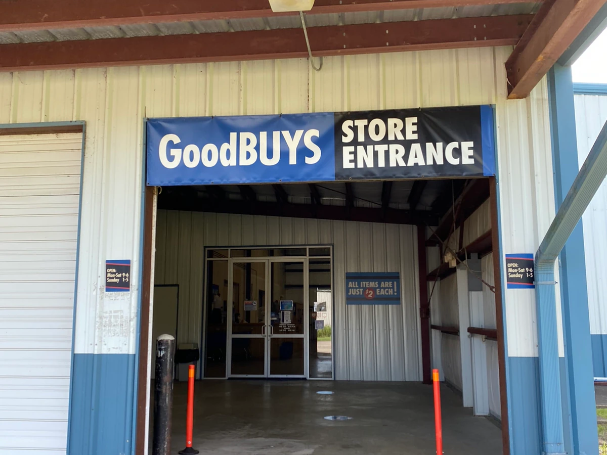 Goodwill Acadiana: GoodBUYS New Iberia in New Iberia, Louisiana, showing neatly organized clothing racks and household goods.