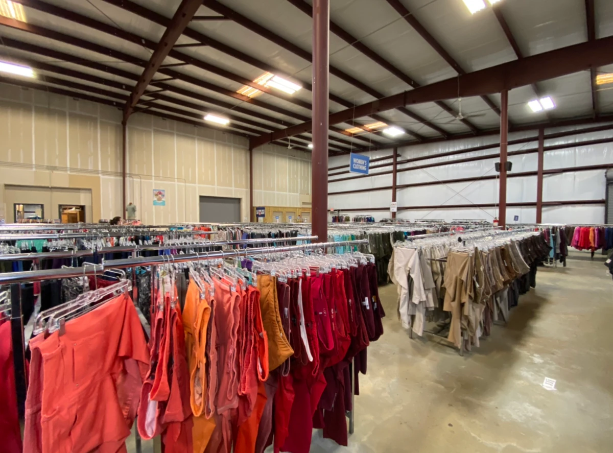 Goodwill Acadiana: GoodBUYS New Iberia, a Goodwill thrift store highlighting the spacious interior layout of the retail stor.