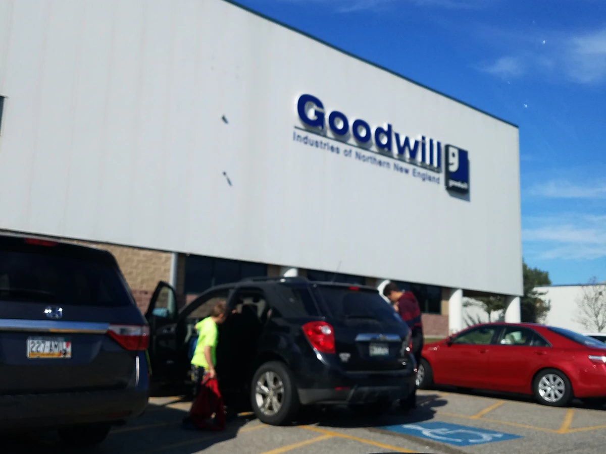 Goodwill Buy the Pound Store & Recycling Center, a Goodwill thrift store showing neatly organized clothing racks and househo.