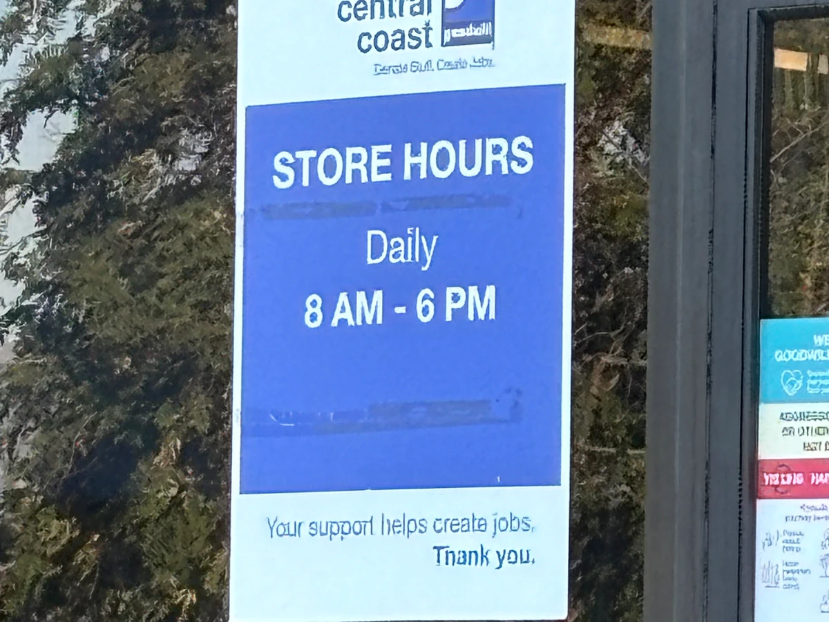 Goodwill Central Coast Outlet in Salinas, California, highlighting organized racks of clothing near the checkout area.
