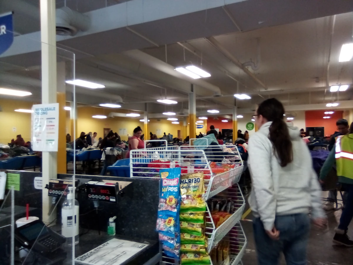 Goodwill - Chaska Wholesale in Chaska, Minnesota, showing rows of affordable footwear and accessories for sale.
