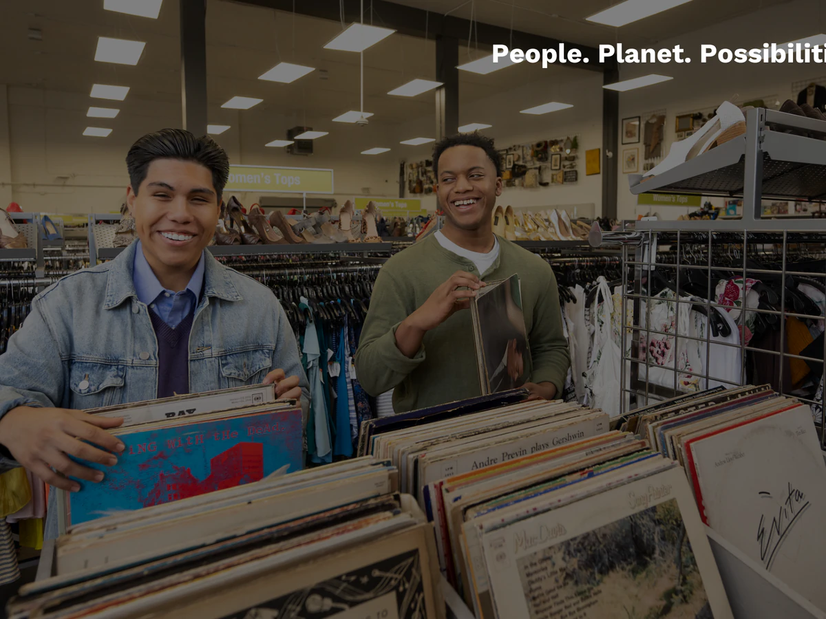 Goodwill Clearance Center in South San Francisco, California, featuring display shelves with books and home decor items.