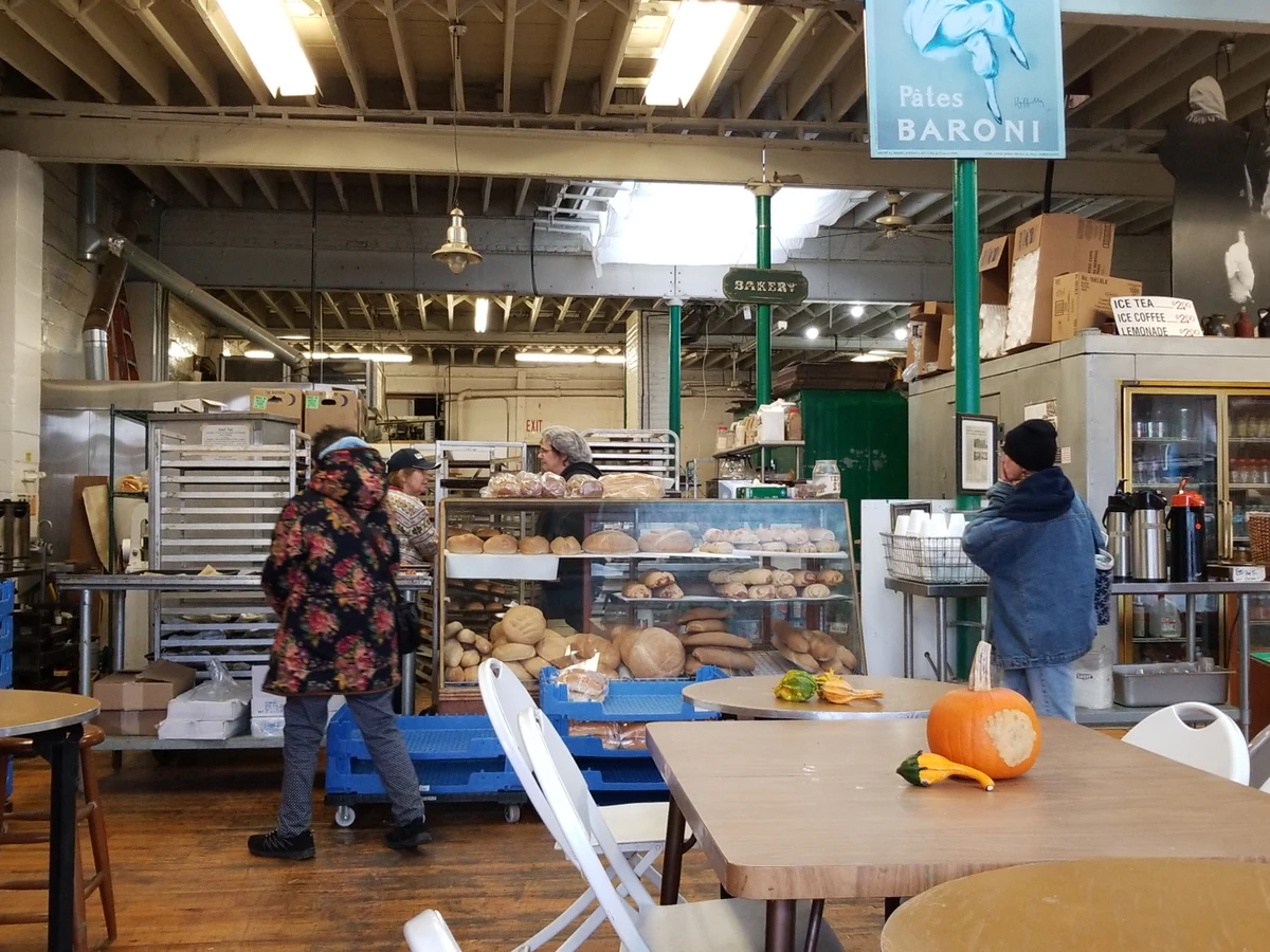 Goodwill Clearance Center in Rochester, New-york, featuring display shelves with books and home decor items.