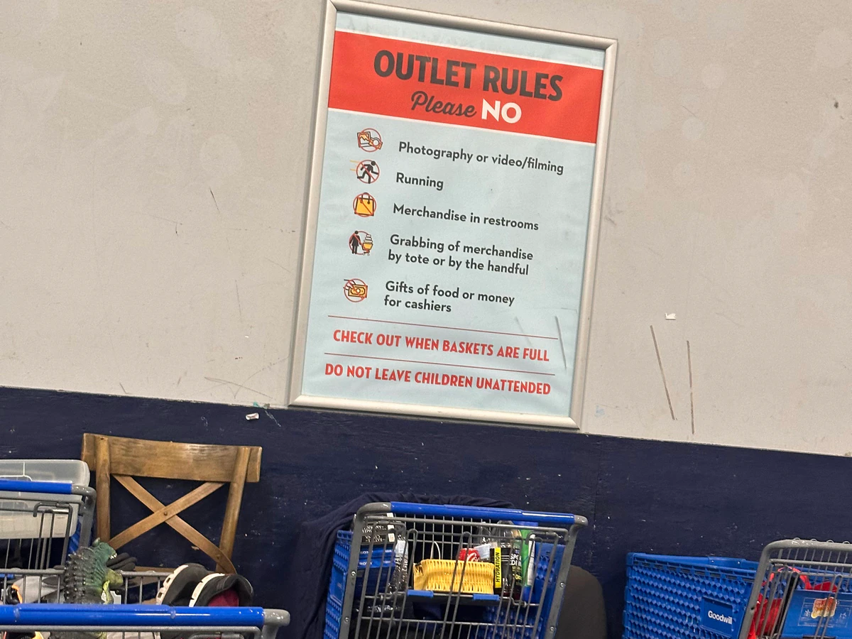 Goodwill Distribution Center - North Outlet in Austin, Texas, showing the donation entrance and bulk pricing signage.