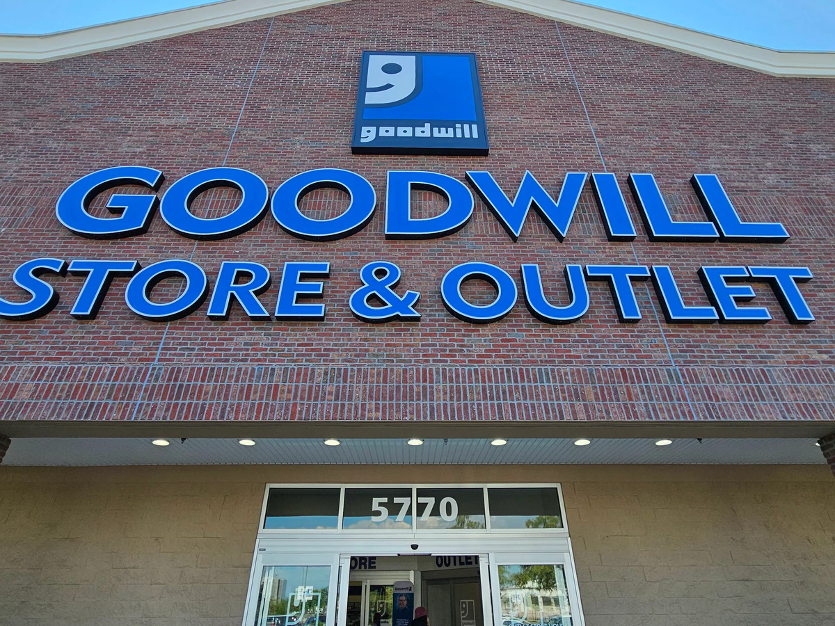 Goodwill East in New Orleans, Louisiana, a Goodwill thrift store showing neatly organized clothing racks and household goods.