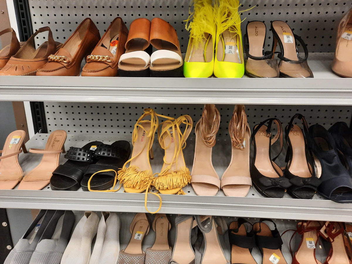 Goodwill East in New Orleans, Louisiana, showing rows of affordable footwear and accessories for sale.