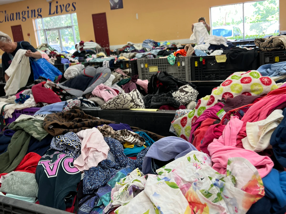 Goodwill Ft. Pierce Bargain Barn in Fort Pierce, Florida, highlighting organized racks of clothing near the checkout area.
