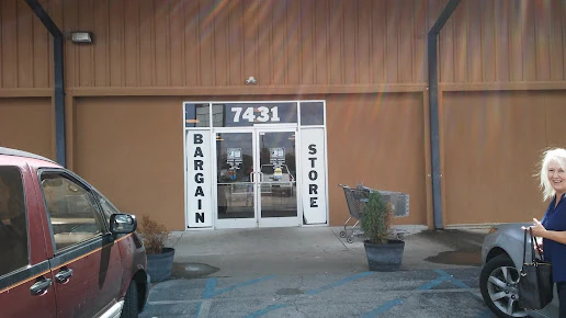 Goodwill Gulf Coast - Airport Bargain Store in Mobile, Alabama, showing the donation entrance and bulk pricing signage.