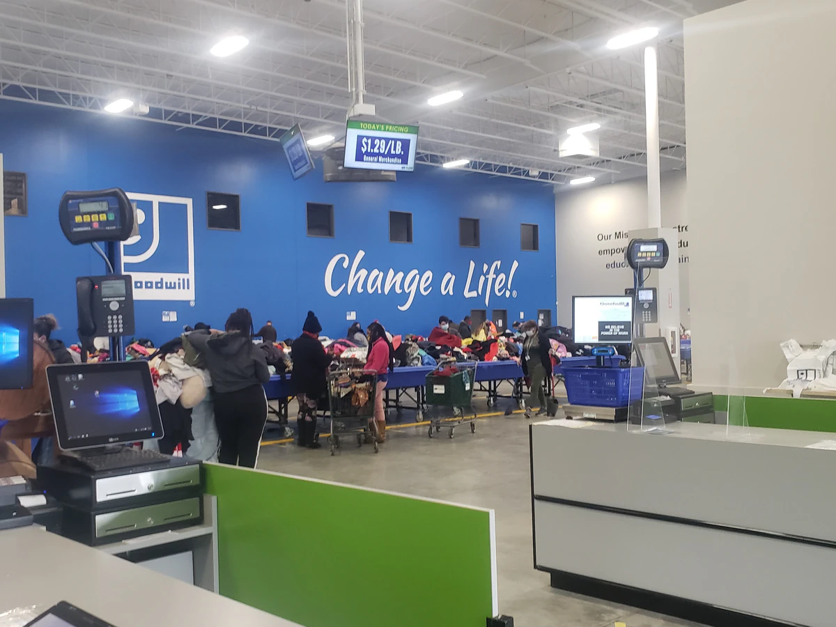 Goodwill in Gary, Indiana, a Goodwill thrift store featuring display shelves with books and home decor items.