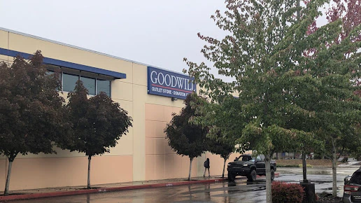 Goodwill Industries Outlet of the Columbia Willamette, a Goodwill outlet store displaying a large open layout with rows of d.