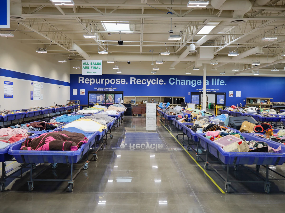Goodwill Industries Outlet Store in Spokane, Washington, displaying a large open layout with rows of donation bins.
