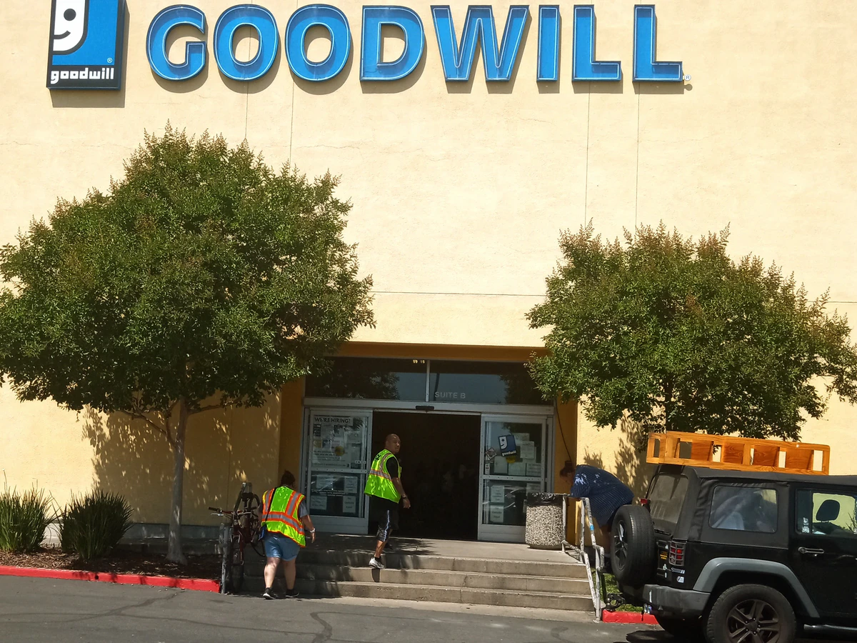 Goodwill Industries Sacramento Valley & Northern Nevada, a Goodwill outlet store showing blue rolling bins filled with disco.