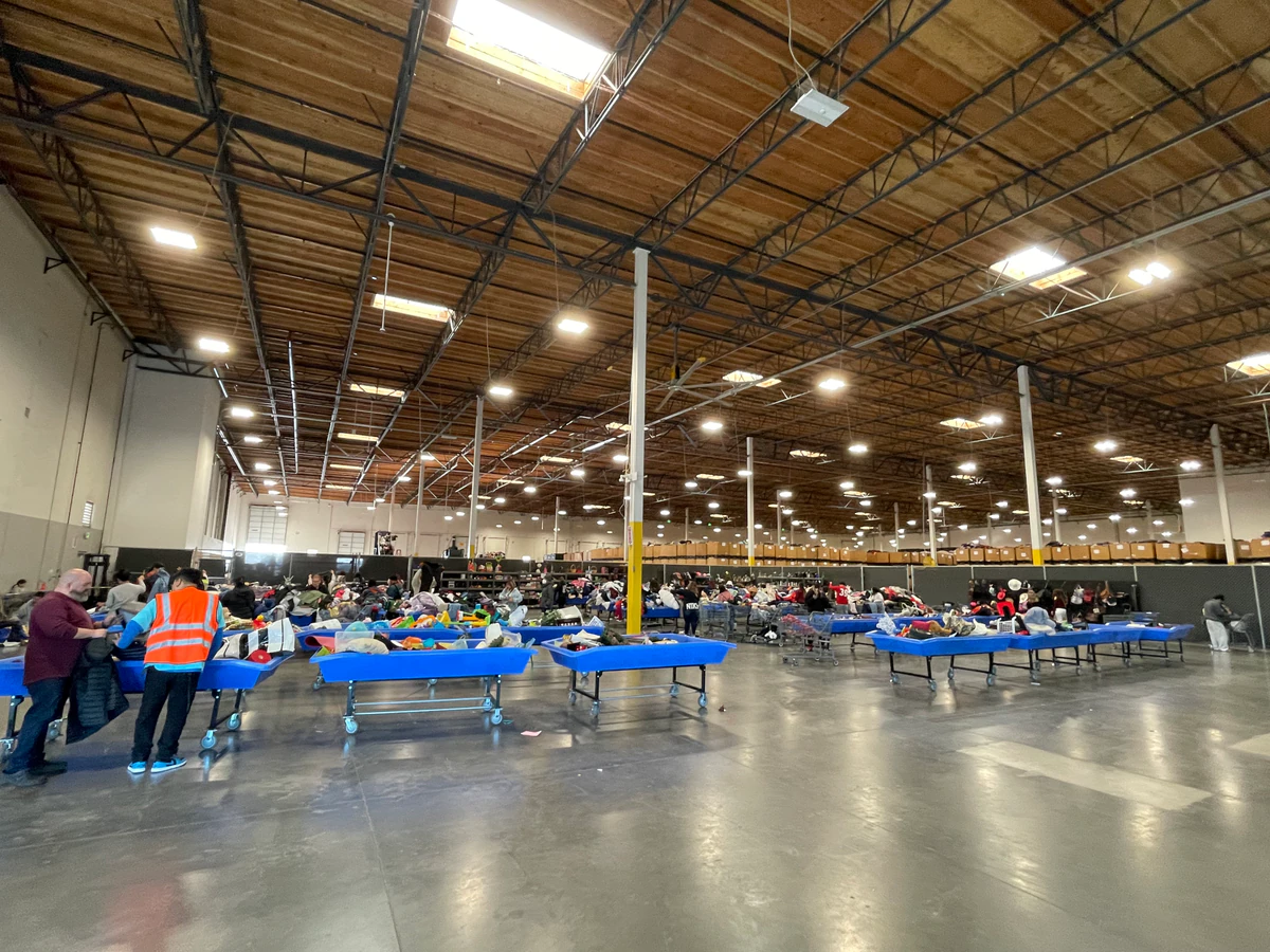 Goodwill Industries San Joaquin Outlet in Stockton, California, displaying a large open layout with rows of donation bins.