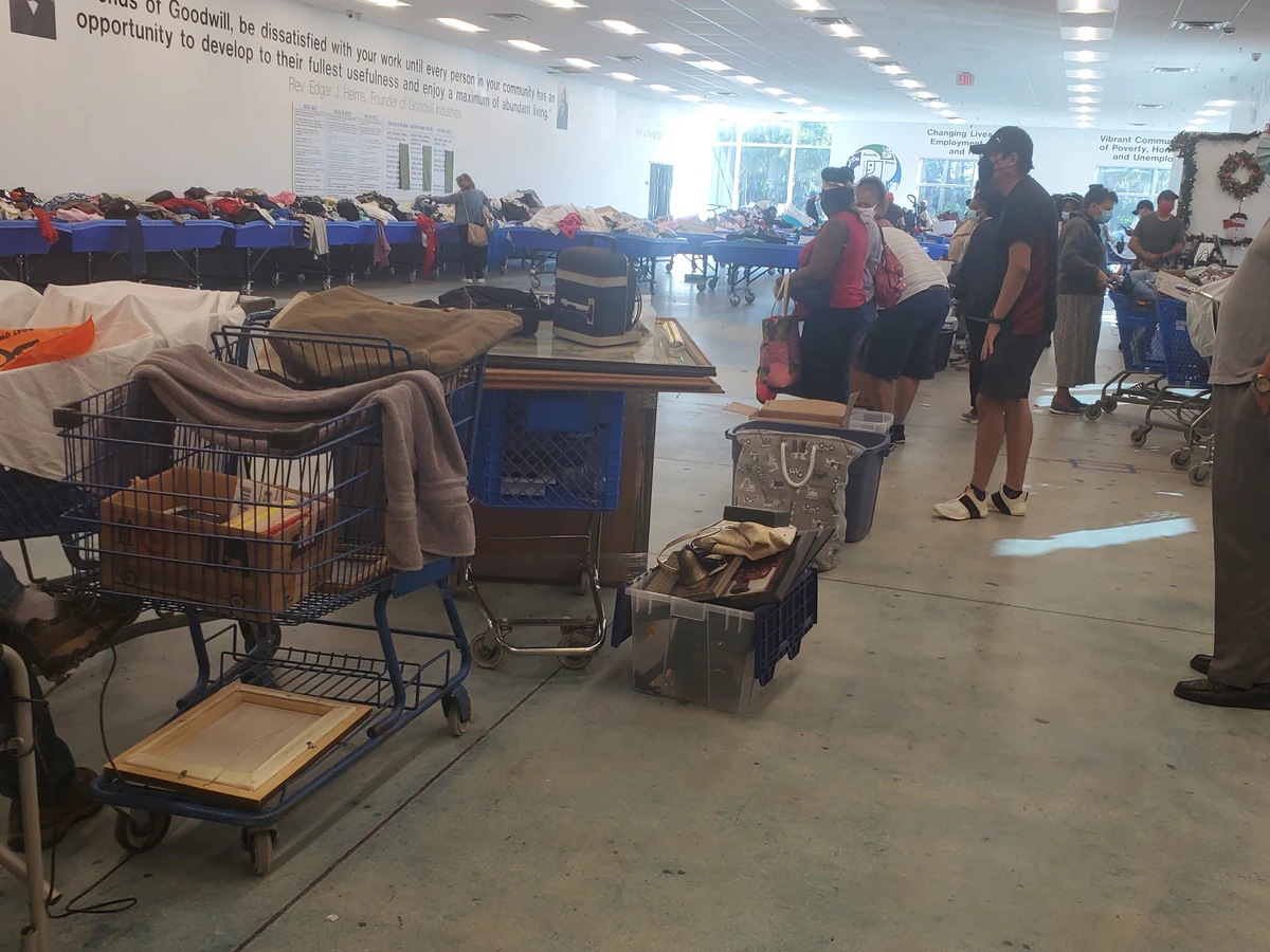 Goodwill Lake Worth Bargain Barn in Lake Worth Beach, Florida, displaying a large open layout with rows of donation bins.