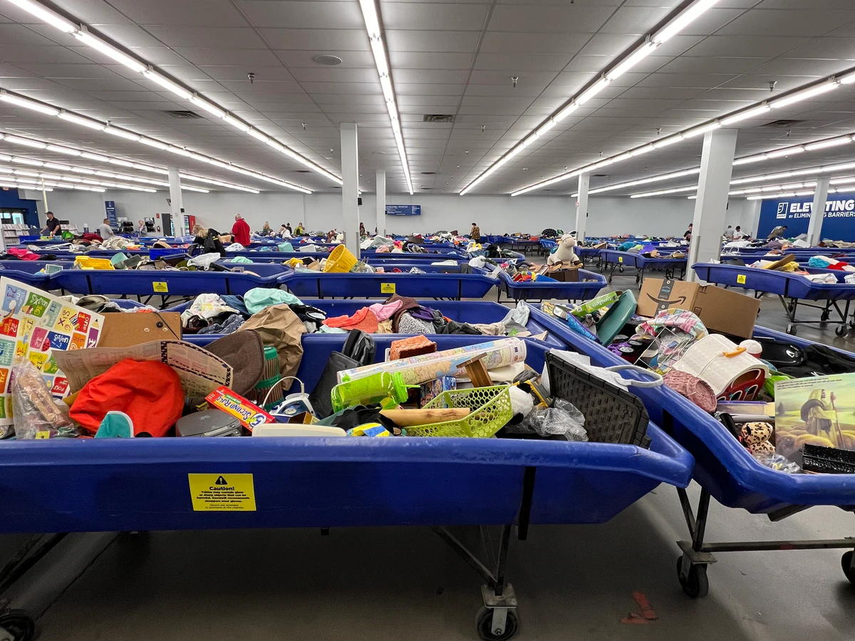 Goodwill NCW Outlet Store in Appleton, Wisconsin, displaying a large open layout with rows of donation bins.