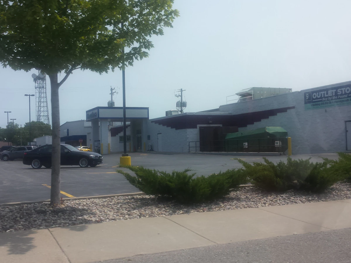 Goodwill NCW Outlet Store in Appleton, Wisconsin, showing the donation entrance and bulk pricing signage.