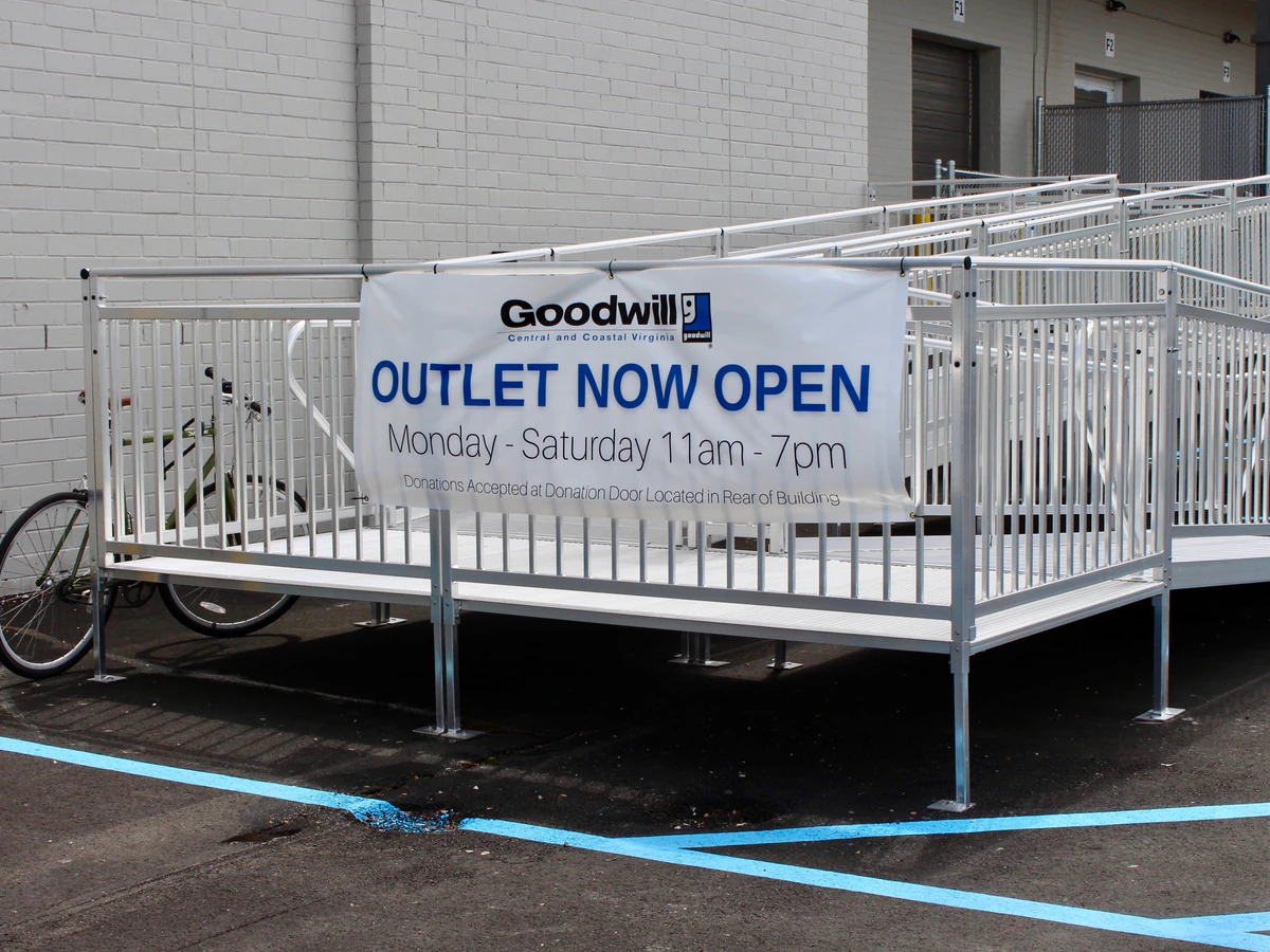 Goodwill of Central and Coastal Virginia Outlet, a Goodwill outlet store showing the donation entrance and bulk pricing sign.