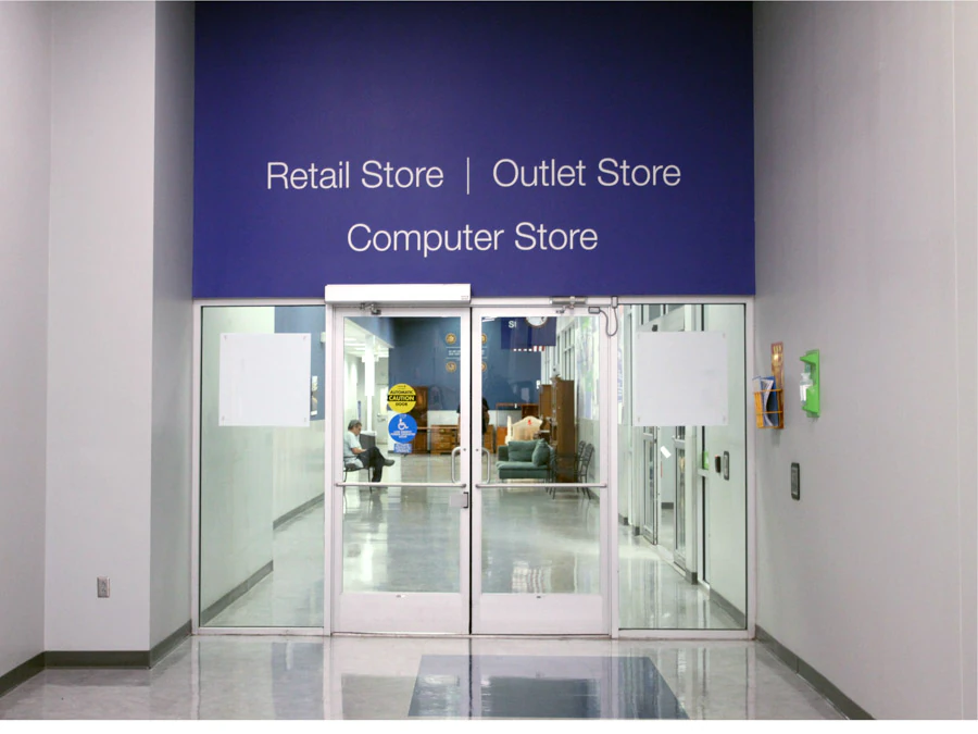 Goodwill of Central and Coastal Virginia in Hampton, Virginia, showing neatly organized clothing racks and household goods.
