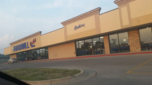 Goodwill of Central Iowa - Outlet in Des Moines, Iowa, displaying a large open layout with rows of donation bins.