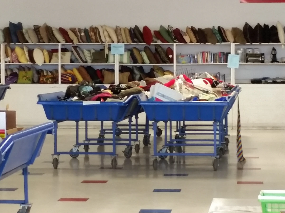 Goodwill of Central Iowa - Outlet in Des Moines, Iowa, showing the donation entrance and bulk pricing signage.