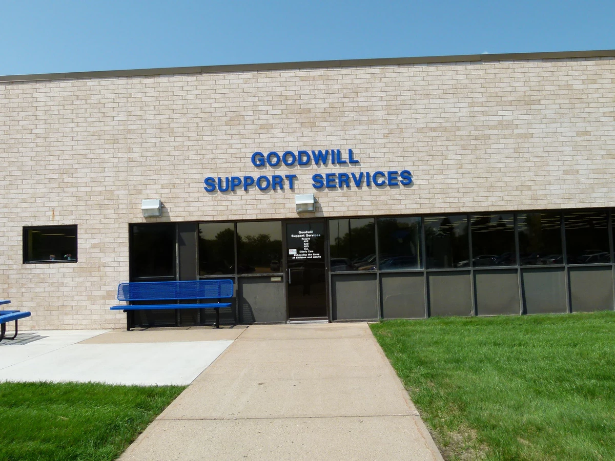 Goodwill of the Great Plains in Sioux City, Iowa, showing neatly organized clothing racks and household goods.