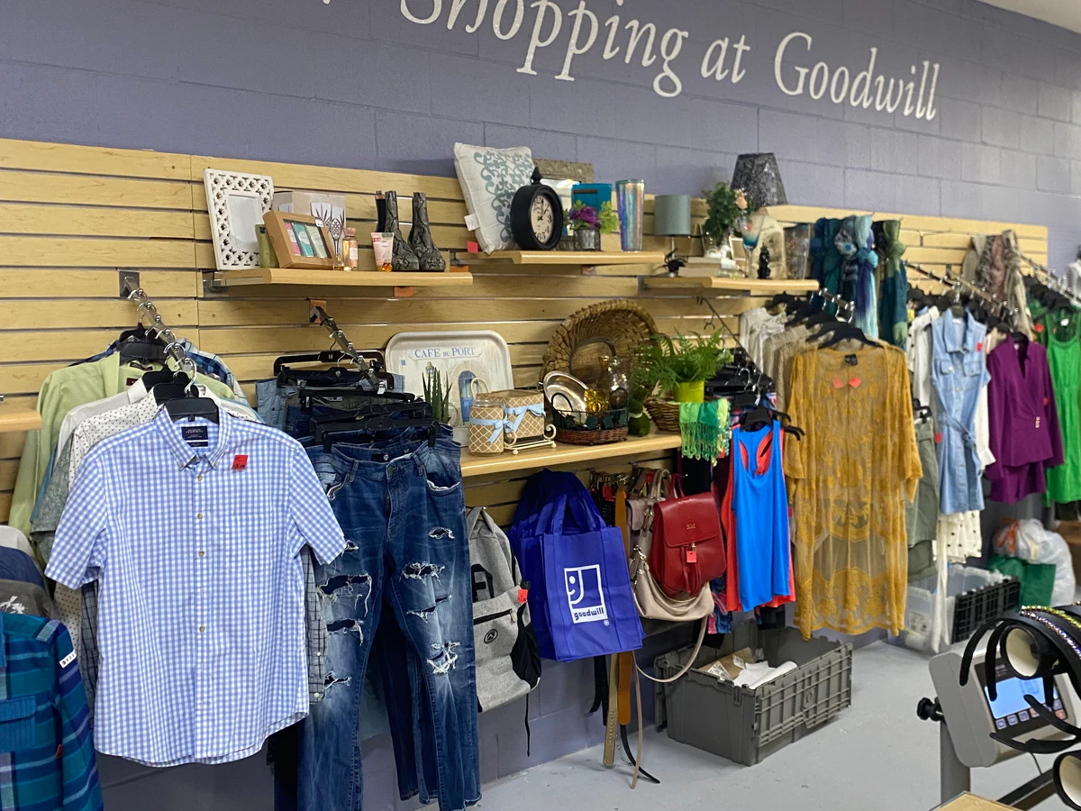 Goodwill Outlet and Donation Center in San Diego, California, showing the donation entrance and bulk pricing signage.