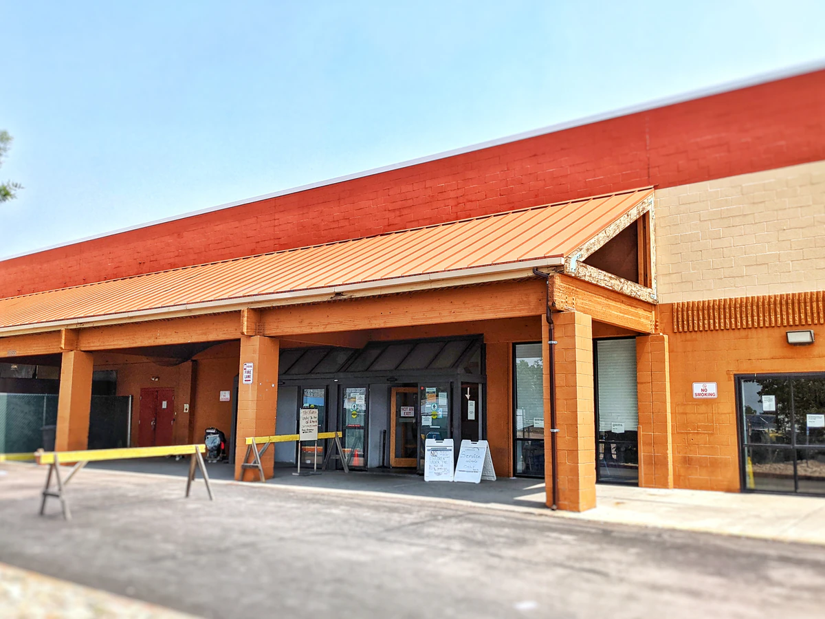 Goodwill Outlet and Donation Center in Colorado Springs, Colorado, showing the donation entrance and bulk pricing signage.