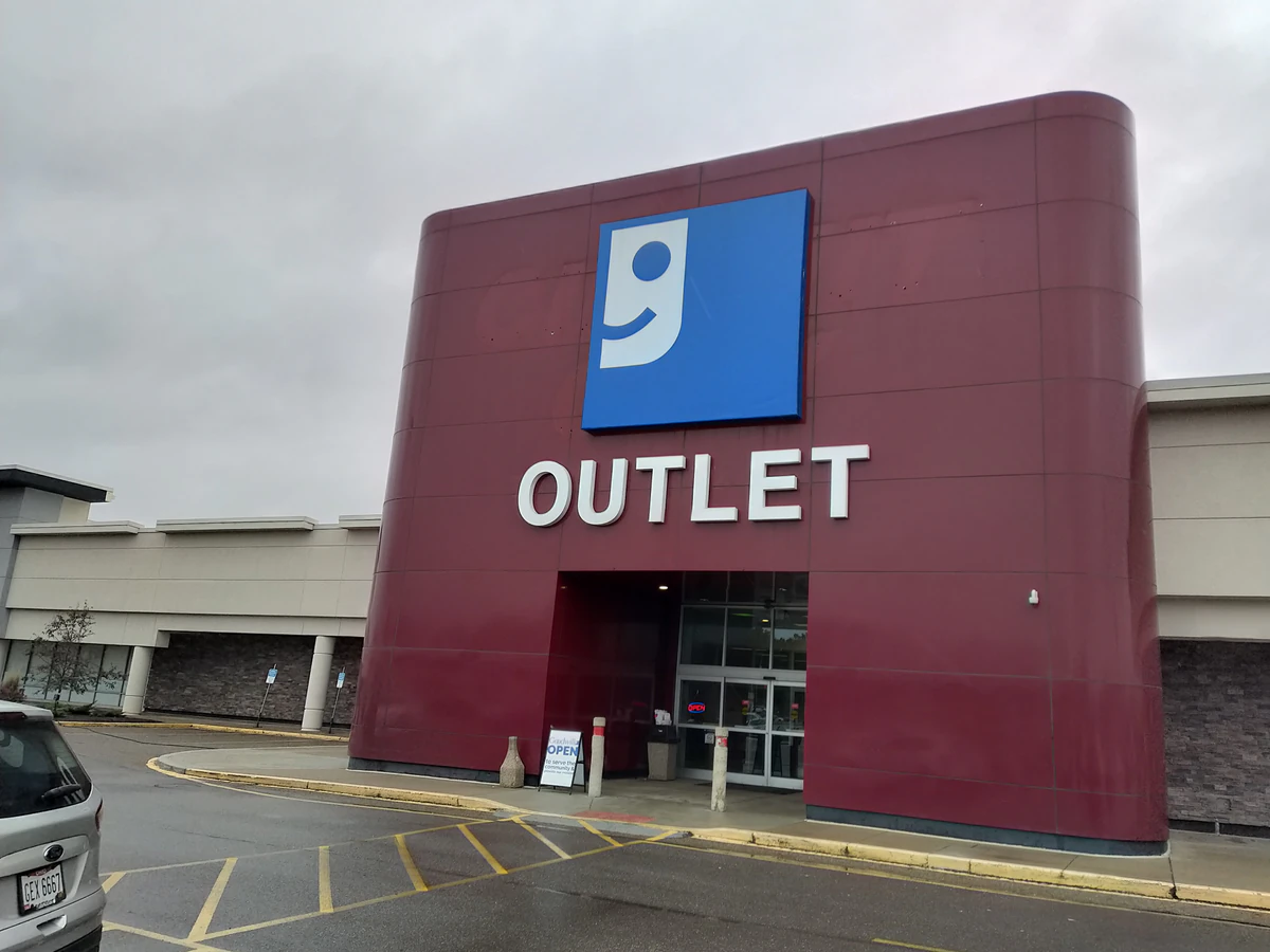 Goodwill Outlet Canton in Canton, Ohio, a Goodwill outlet store showing blue rolling bins filled with discounted merchandise.