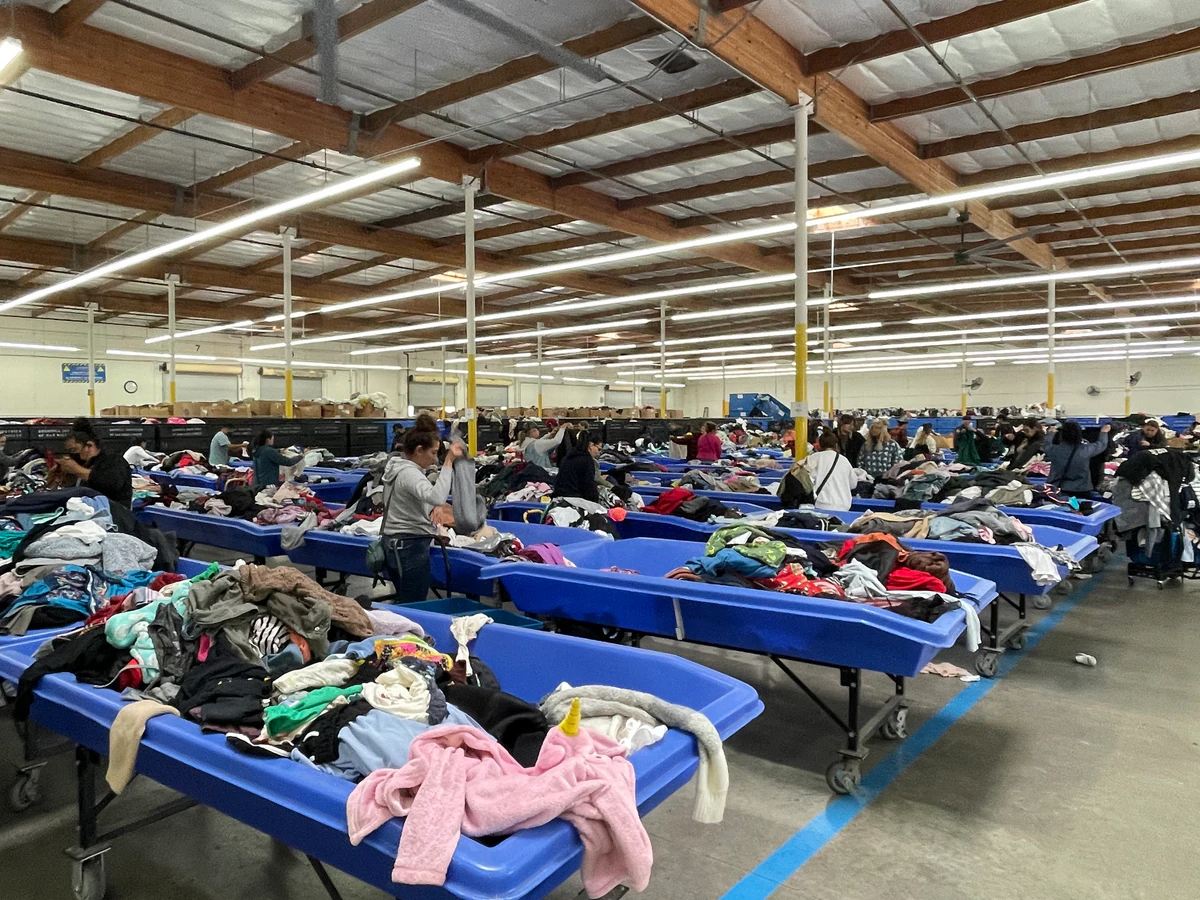 Goodwill Outlet Center and Donation Center, a Goodwill outlet store displaying a large open layout with rows of donation bin.