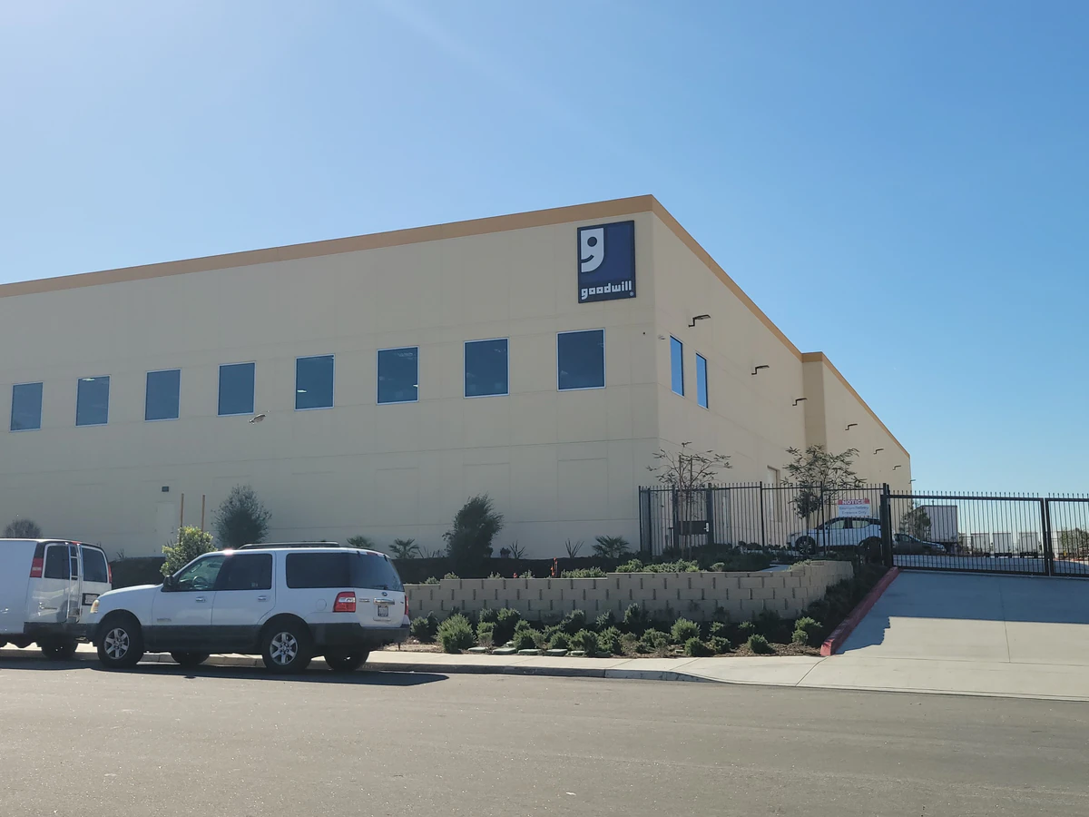 Goodwill Outlet Center, Electronics Store and Donation Center, a Goodwill outlet store featuring shoppers searching through .