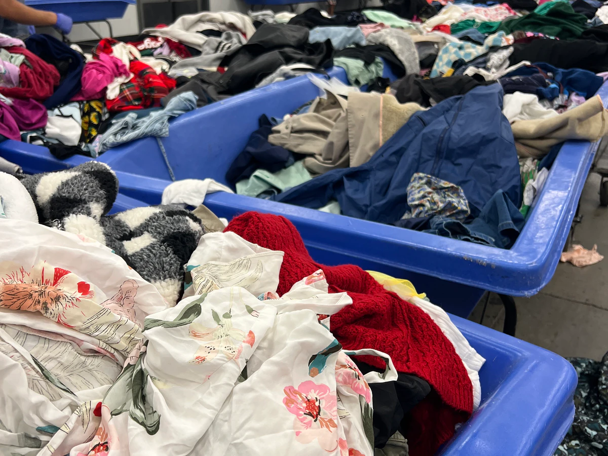Goodwill Outlet Center in Middletown, Pennsylvania, displaying a large open layout with rows of donation bins.