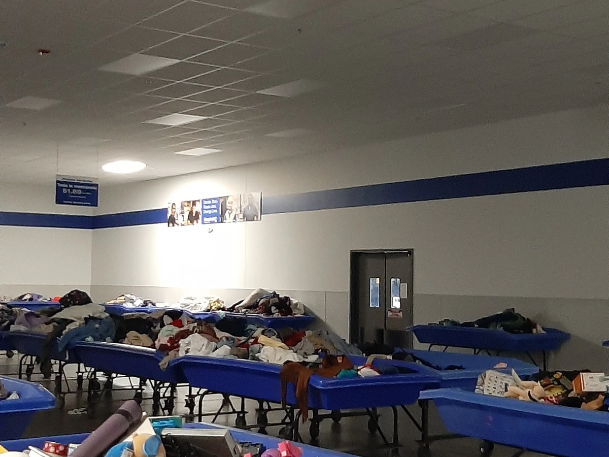 Goodwill Outlet Center in Middletown, Pennsylvania, highlighting organized racks of clothing near the checkout area.