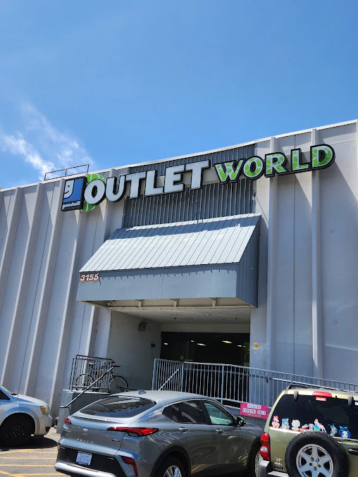 Goodwill Outlet in Denver, Colorado, a Goodwill outlet store displaying a large open layout with rows of donation bins.