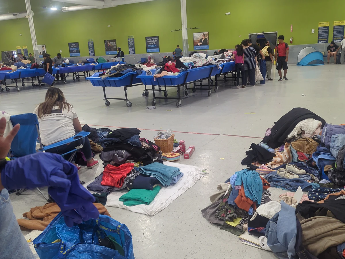 Goodwill Outlet in Denver, Colorado, a Goodwill outlet store highlighting organized racks of clothing near the checkout area.