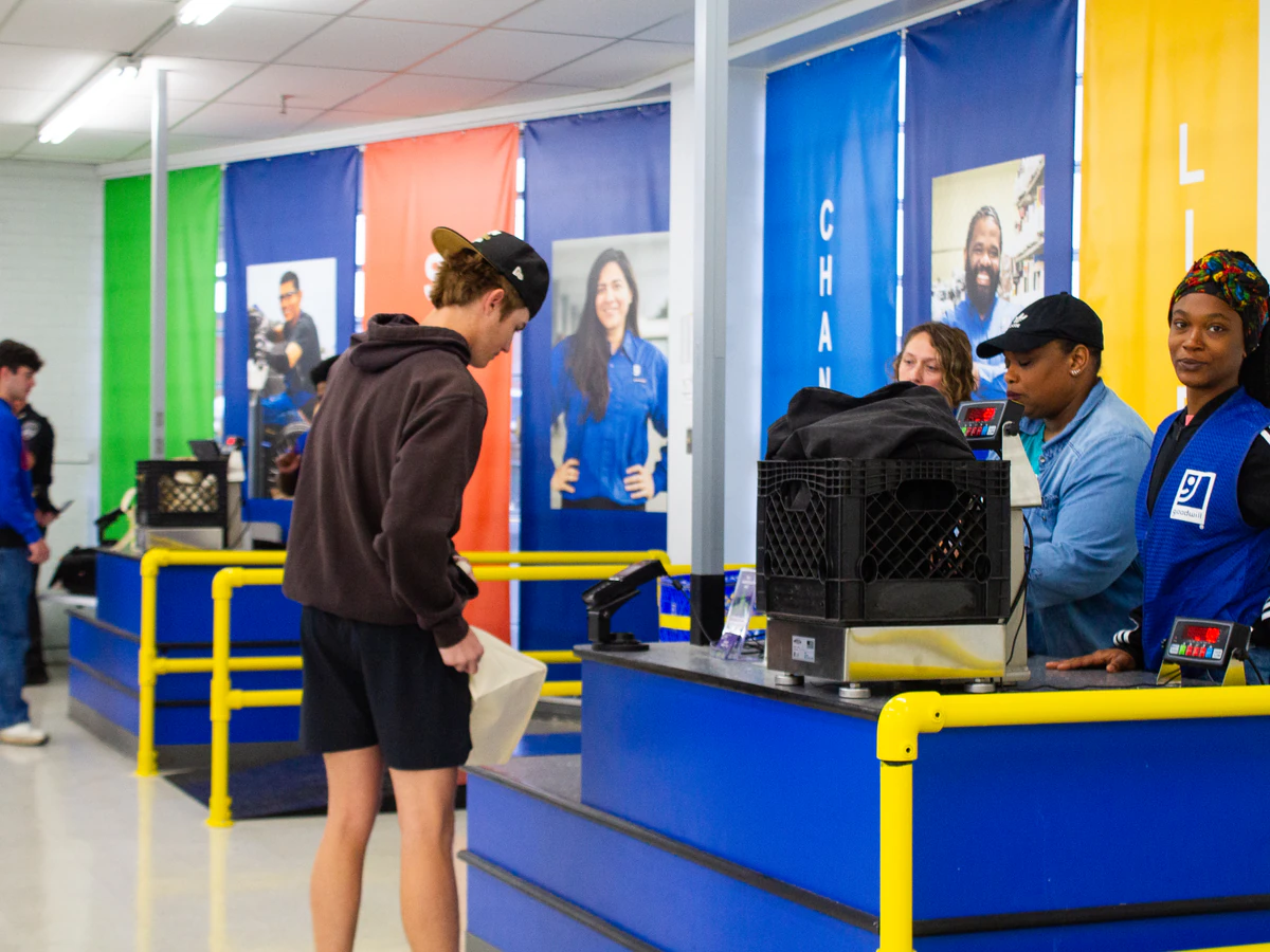Goodwill Outlet in Evansville, Indiana, a Goodwill outlet store displaying a large open layout with rows of donation bins.