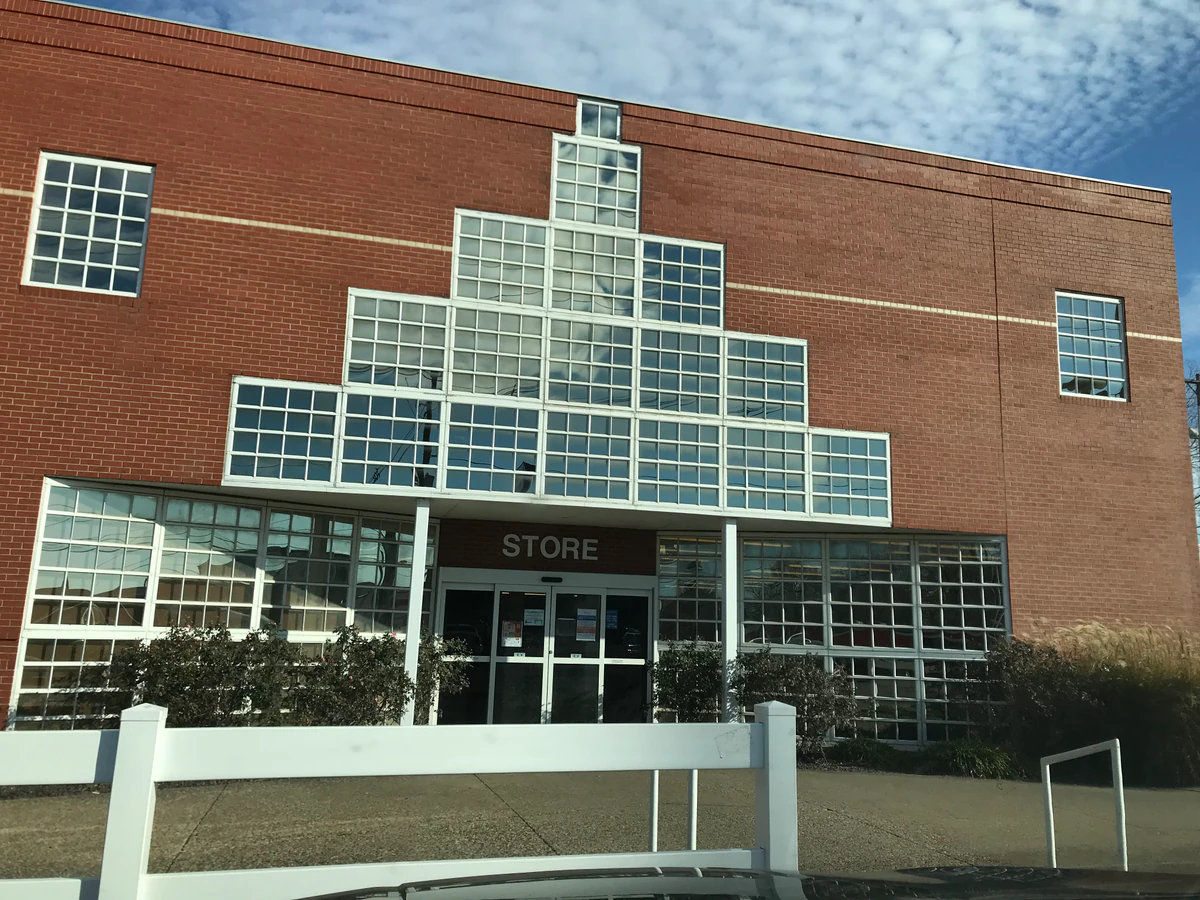 Goodwill Outlet in Evansville, Indiana, a Goodwill outlet store showing the donation entrance and bulk pricing signage.