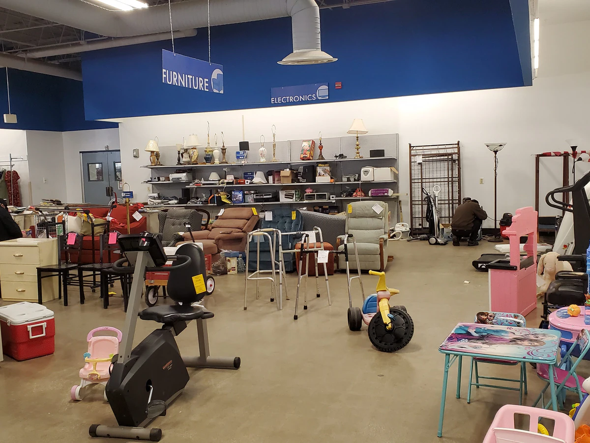 Goodwill Outlet in Akron, Ohio, a Goodwill outlet store showing blue rolling bins filled with discounted merchandise.