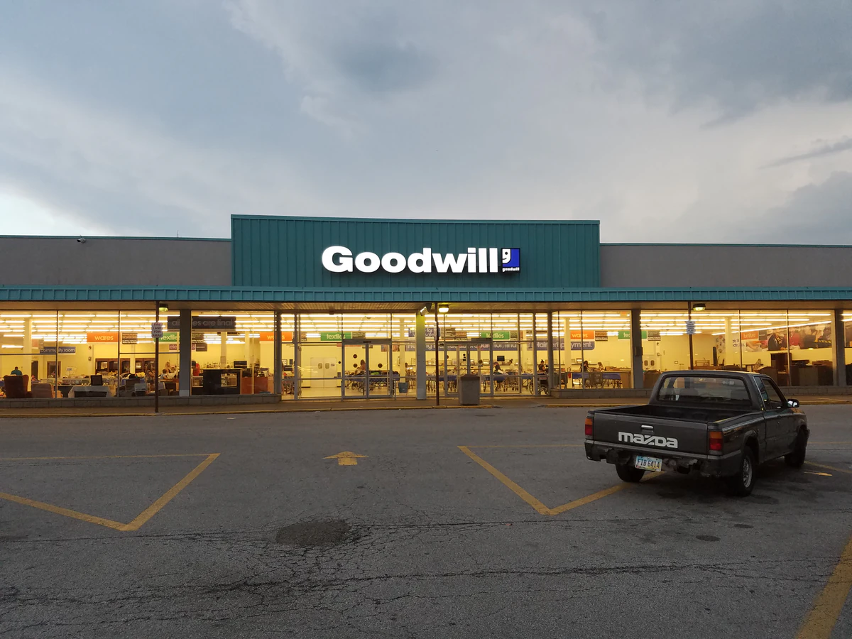 Goodwill Outlet in Akron, Ohio, a Goodwill outlet store showing the donation entrance and bulk pricing signage.