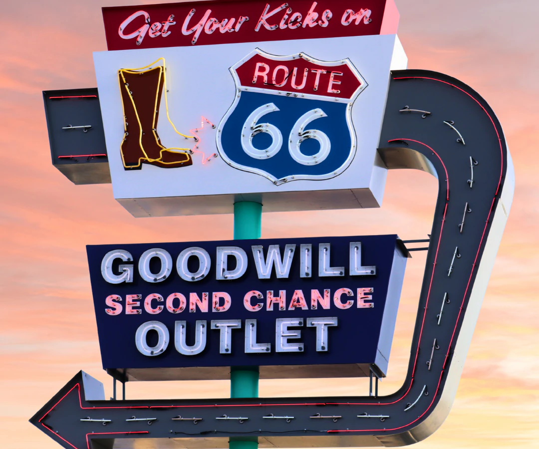 Goodwill Outlet in Tulsa, Oklahoma, a Goodwill outlet store featuring shoppers searching through bulk textile containers.