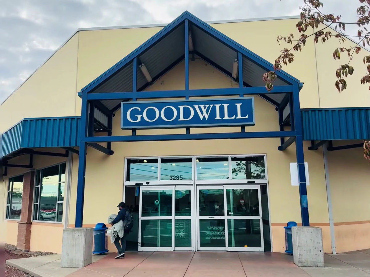 Goodwill Outlet Salem in Salem, Oregon, a Goodwill outlet store showing blue rolling bins filled with discounted merchandise.