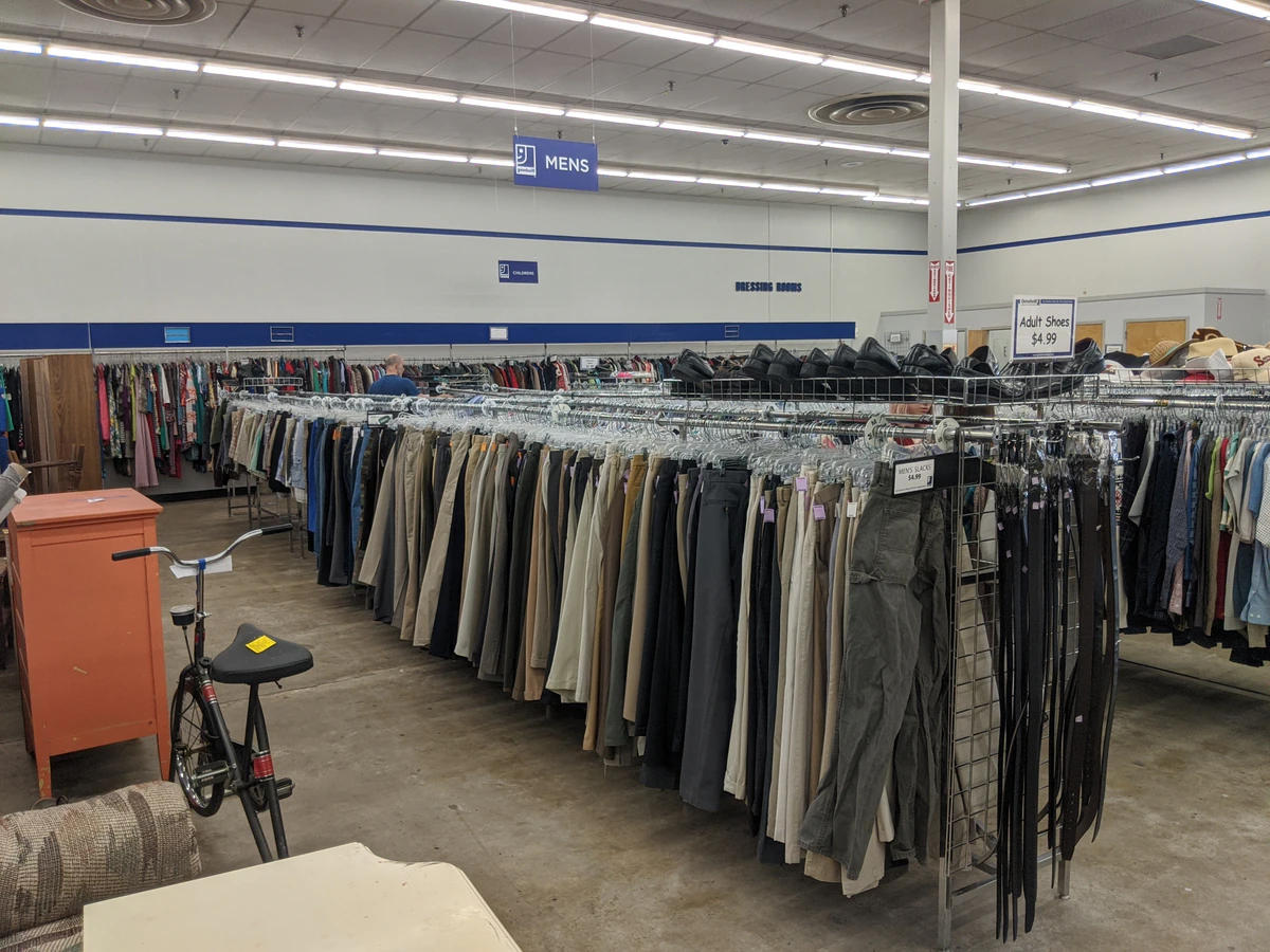 Goodwill Outlet Store and Donation Center, a Goodwill outlet store highlighting organized racks of clothing near the checkou.