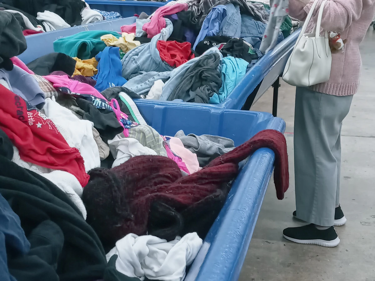 Goodwill Outlet Store in Little Rock, Arkansas, displaying a large open layout with rows of donation bins.