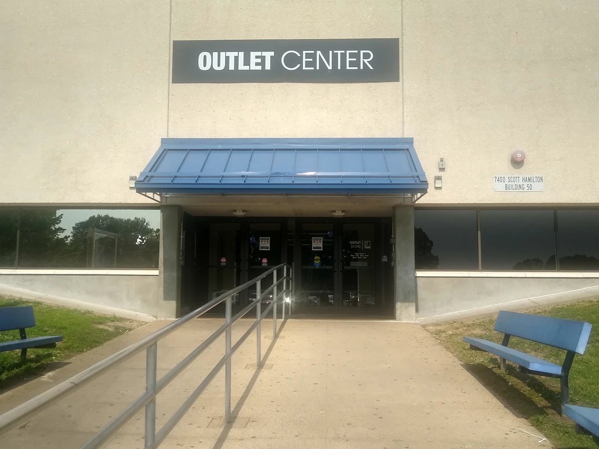Goodwill Outlet Store in Little Rock, Arkansas, showing the donation entrance and bulk pricing signage.