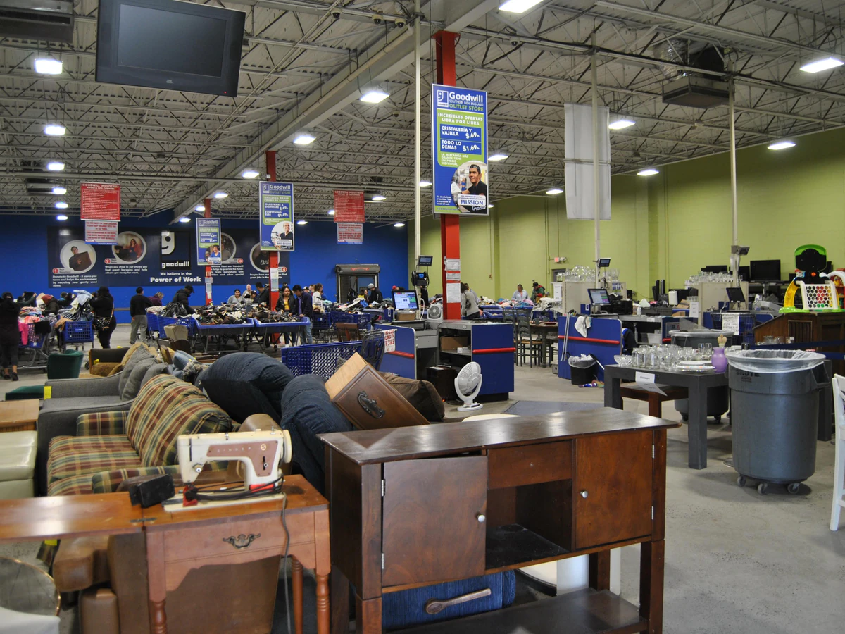 Goodwill Outlet Store in Hamden, Connecticut, displaying a large open layout with rows of donation bins.