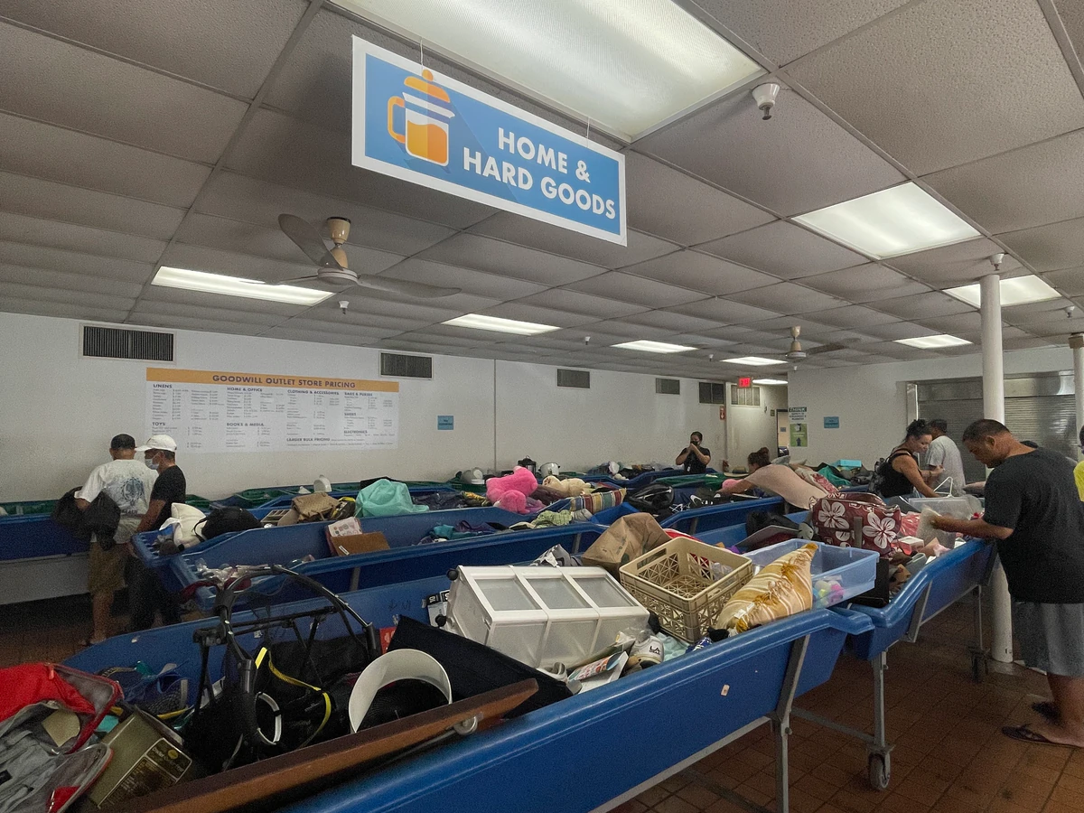 Goodwill Outlet Store in Honolulu, Hawaii, a Goodwill outlet store showing the donation entrance and bulk pricing signage.