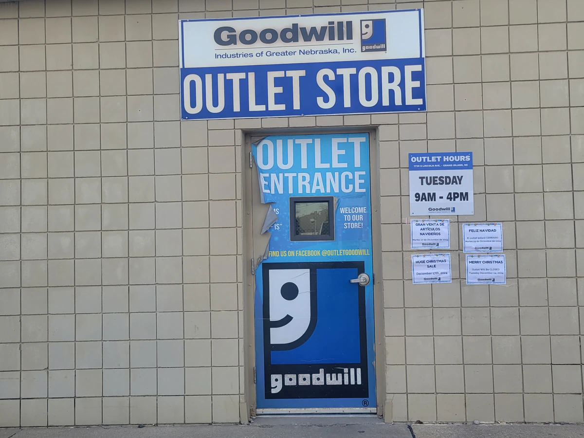 Goodwill Outlet Store in Grand Island, Nebraska, highlighting organized racks of clothing near the checkout area.