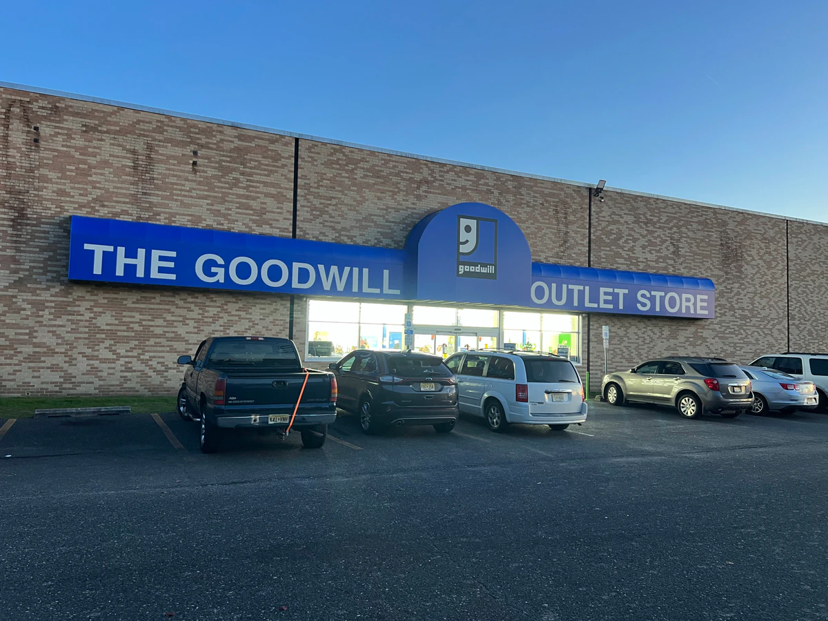 Goodwill Outlet Store in Bellmawr, New-jersey, showing blue rolling bins filled with discounted merchandise.