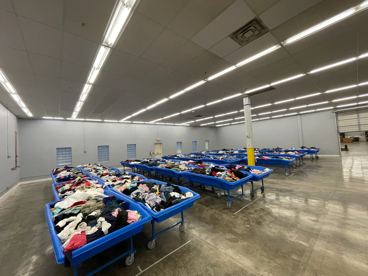 Goodwill Outlet Store in Hamburg, New-york, displaying a large open layout with rows of donation bins.