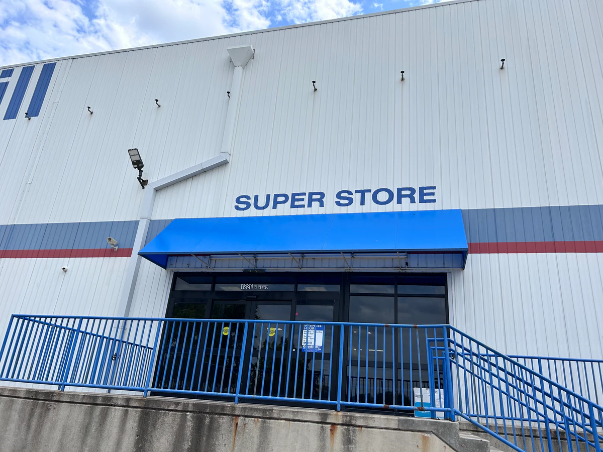 Goodwill Outlet Store in Oklahoma City, Oklahoma, showing blue rolling bins filled with discounted merchandise.