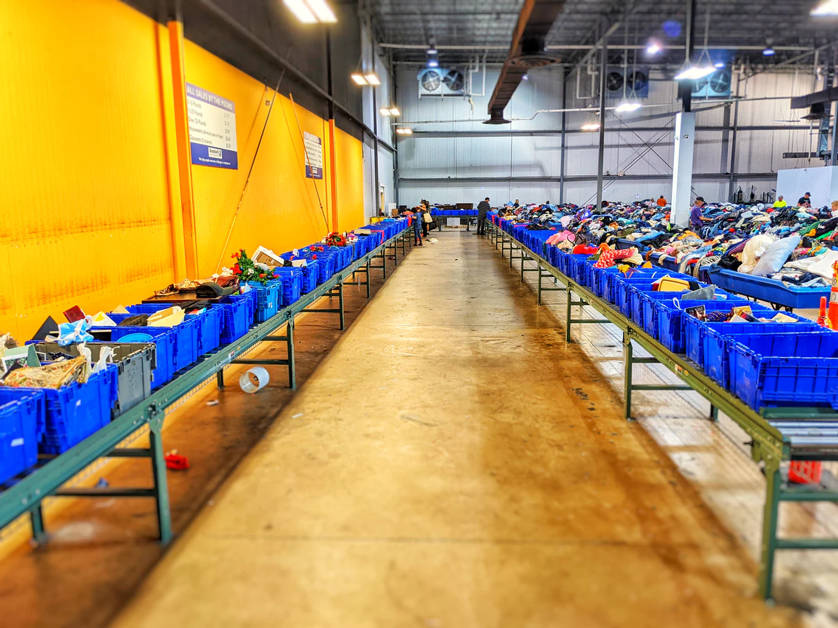 Goodwill Outlet Store in Oklahoma City, Oklahoma, displaying a large open layout with rows of donation bins.